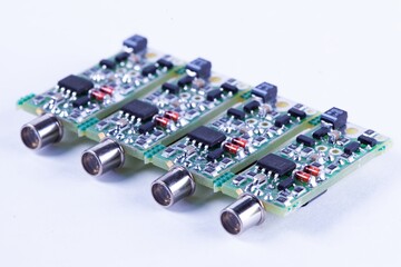 Close-up of four small microcircuits PCB