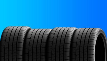 Obraz premium Sport car tires. New set of car tires. New car tires isolated on blue background
