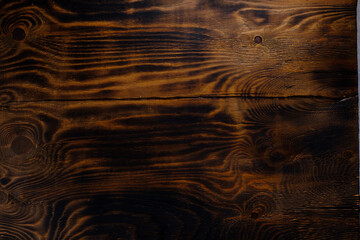The texture of the Burnt wooden Board, charred bar BBQ background