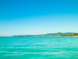 Blue water of Tyrrhenian sea in Vada, Tuscany, Italy.