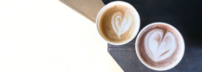 two cups of coffee cappuccino and latte art