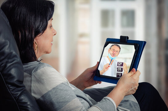 Telemedicine Physician Informs The Remote Female Patient Results Of The Breast Cancer Screening Test.