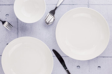 Empty white plate and kitchenware