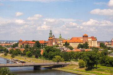 Fototapeta na wymiar Krakow, Poland top view of old town and Wawel Poland top view of old town and Wawel castle on the hill, Visla river. View of the historic center, Aerial View