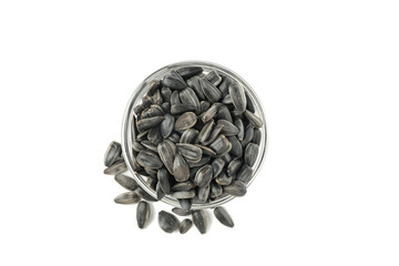 Bowl of sunflower seeds isolated on white background