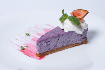 tasty cheesecake with strawberry and cream isolated