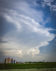 Old, abandoned grain elevators on the Great Plains with Dramatic Clouds