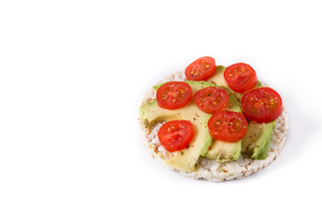 Puffed rice cake with tomatoes and avocado isolated on white background. Copy space