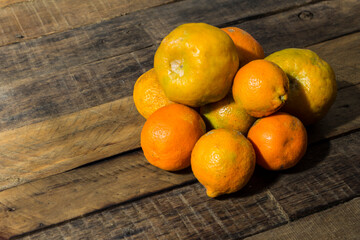 tangerines on a wooden table