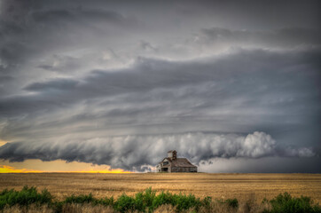 Old, Abandoned Structures on the Great Plains as Storms Approach