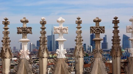 Fototapeta na wymiar Stone crosses of the Duomo of Milan, (Milan Cathedral), Italy. 