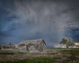 Old, Abandoned Structures on the Great Plains as Storms Approach