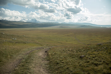Amazing Altay. Plateau Ukok, view of a steppe at the plateau Ukok. Russian adventures. Mountain hiking in the Altai republic. Active holiday with family and friends. 
