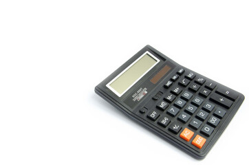 Big black calculator is located on the right on a white background

