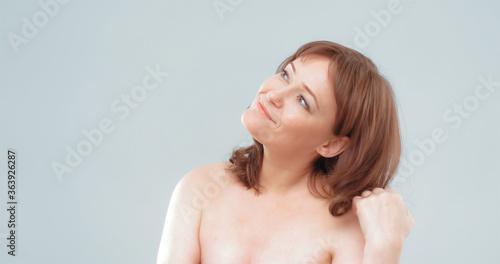 Naked woman touching woman
