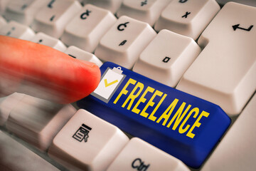 Word writing text Freelance. Business photo showcasing working at different firms rather than being...
