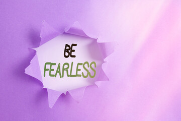 Writing note showing Be Fearless. Business concept for act of striving to lead an extraordinary...