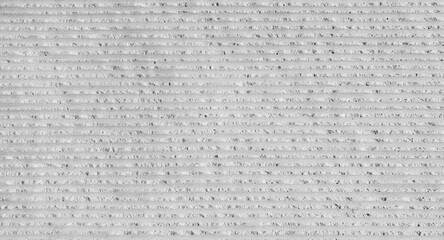 close up view of striped concrete surface sample. abstract design of rough grey texture for modern building wall. abstract white and grey concrete lines pattern background.