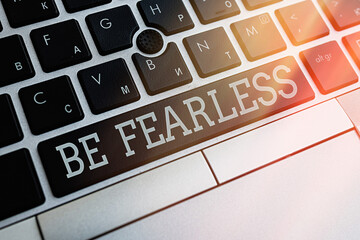 Writing note showing Be Fearless. Business concept for act of striving to lead an extraordinary...