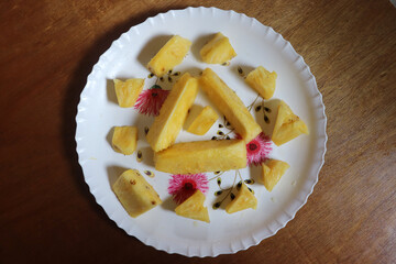 Ripe pineapple slices top view