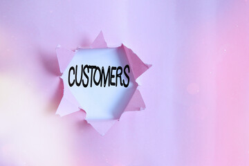 Handwriting text writing Customers. Conceptual photo individual or organization purchasing products...