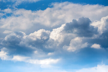 Heavenly blue sky with white clouds background