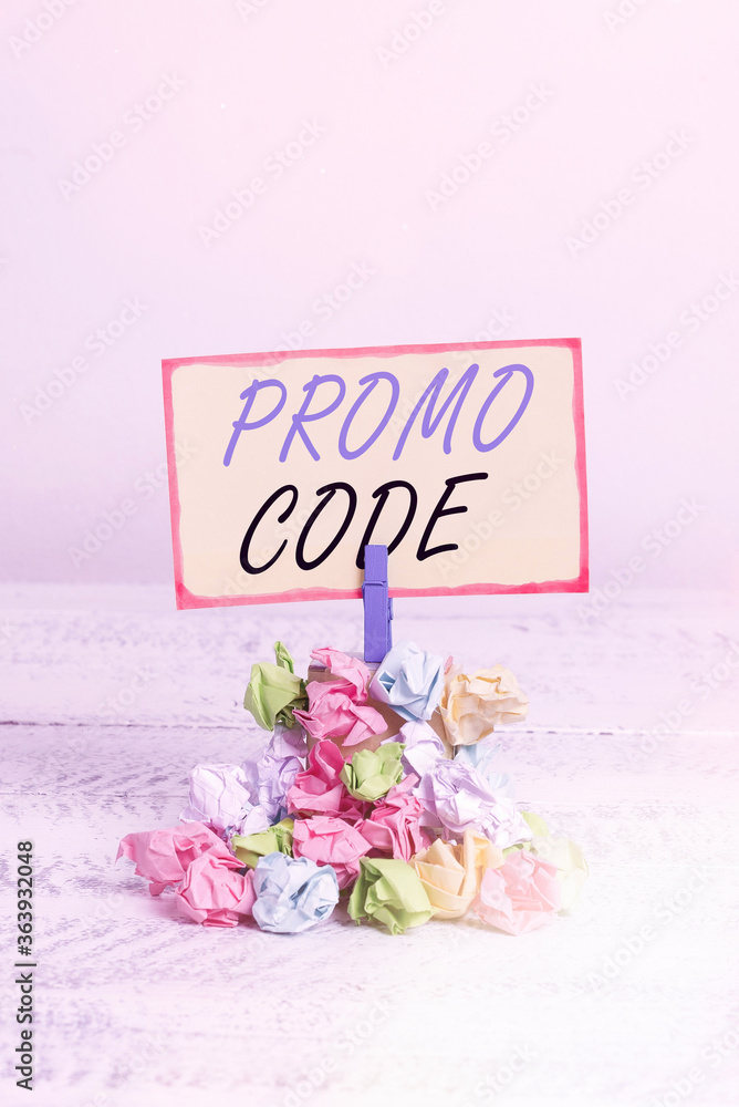 Aufkleber writing note showing promo code. business concept for letters or numbers that allows getting a disco