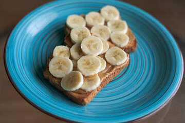 Toast, natural peanut butter and banana