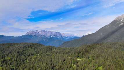 Fototapeta premium Alpin landscape with beautiful mountains in summertime, view from drone