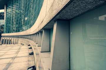 Close-up of the glass exterior walls of outdoor public venues.