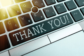 Writing note showing Thank You. Business concept for polite expression to acknowledge a gift,...