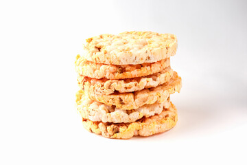 cornbread tortillas on a white background close up macro. bread stacked in a pile on a light background