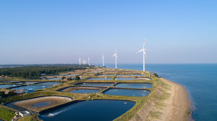 Seaside wind power generation and coastal salt and farming farms.