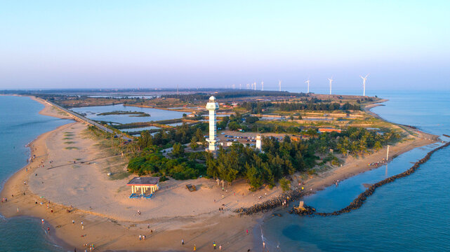Aerial photo of sailing lighthouse by the sea