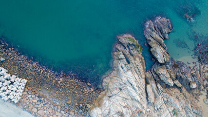 Drones take pictures of rocks and roads along the coast