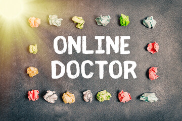 Handwriting text writing Online Doctor. Conceptual photo health practitioners who deliver healthcare over the internet Paper accesories with digital smartphone arranged on different background