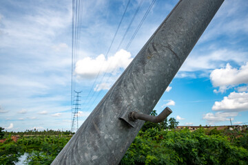 Close-up of metal connecting screws in a high voltage tower for outdoor power transmission