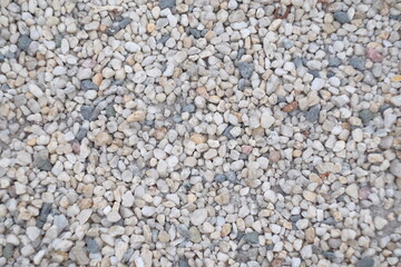 Sea pebbles. Small stones gravel texture background.Pile of pebbles, thailand.