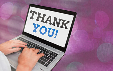 Writing note showing Thank You. Business concept for polite expression to acknowledge a gift,...