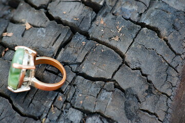 Ring on a wooden background.
