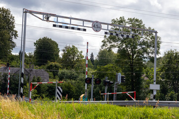 Fototapeta na wymiar Railroad crossing in the suburbs. Summer. Day.