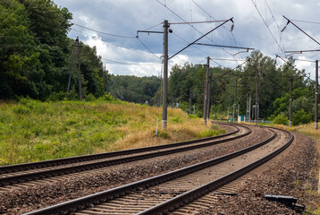 Railway electrified road leading to the city.