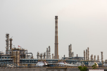 Fototapeta premium Refinery plant under the background of blue sky white clouds