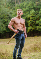 Handsome shirtless man muscular body. Muscular athlete in forest. Sport and fitness. Muscular body....