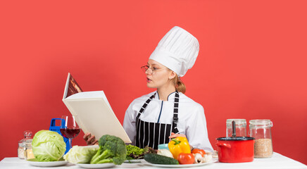 decent diet is best diet. cooking concept. Working in a Modern Kitchen. woman chef read cookbook. Can be used for cooking. Food studio in restaurant. Chef prepare recipe. Recipe book. The best recipe