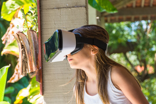 Child Glimpsed With Virtual Reality Glasses Travels With Technology