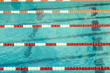 Red and white swim lane lines in a crisp pool - 363951685