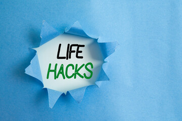 Writing note showing Life Hacks. Business concept for strategy or technique adopted to manage...