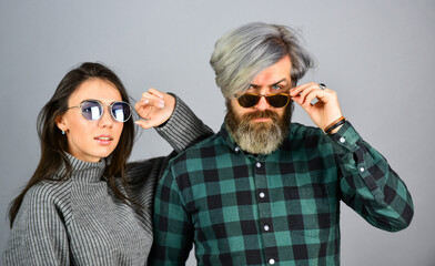 Outdoor Autumn outfit. stylish couple of models in autumn outfits posing. Fashion couple in love....