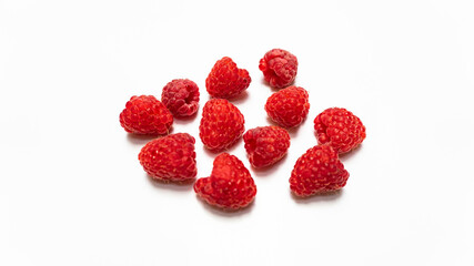 red raspberries in a white background